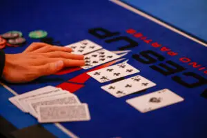 Community cards dealt on a poker table during a game of Texas Hold'em