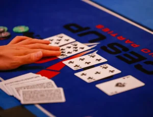 Community cards dealt on a poker table during a game of Texas Hold'em